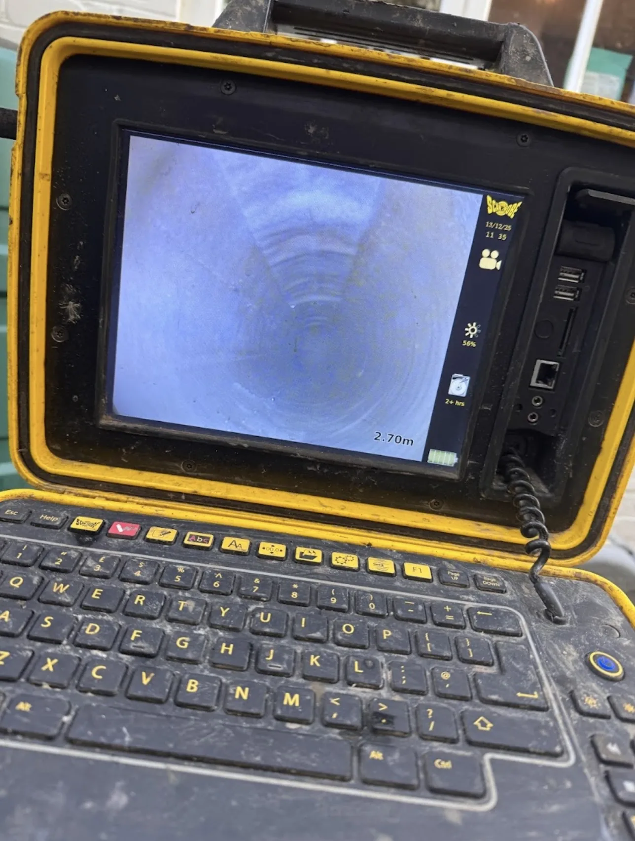 Total Drainage CCTV survey monitor showing the inside of a customer's pipe